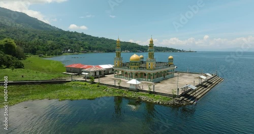 Aerial view of Linuk Masjid a mosque beside the Lake Lanao in Lanao del Sur. Mindanao, Philippines. photo