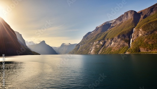 majestic fjords with steep cliffs and deep blue waters serene sky conveying the tranquility and magnificence of glacially carved landscapes photore photo