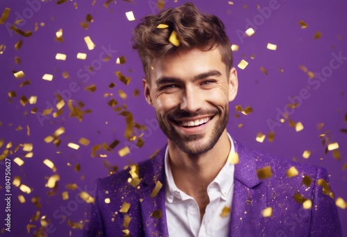 'happy man background handsome celebration portrait confetti purple golden smiling businessman people guy gold face beauty party luxury elegant fashion new year christmas friends joy love fun smil'