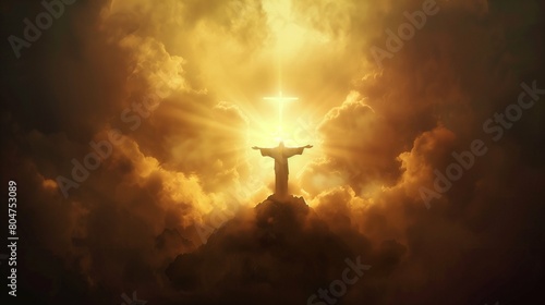 Silhouette of Jesus with arms raised towards the sky in sign of redemption and spirituality. King of the world photo