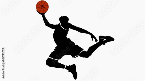 a male basketball player hitting the ball by jumping in a great silhouette © muza