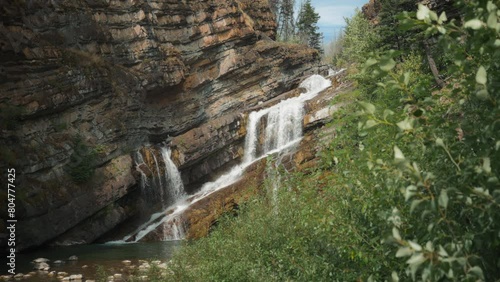 water falling down the cameron falls in waterton national park slow motion SBV 347725472 4K  photo