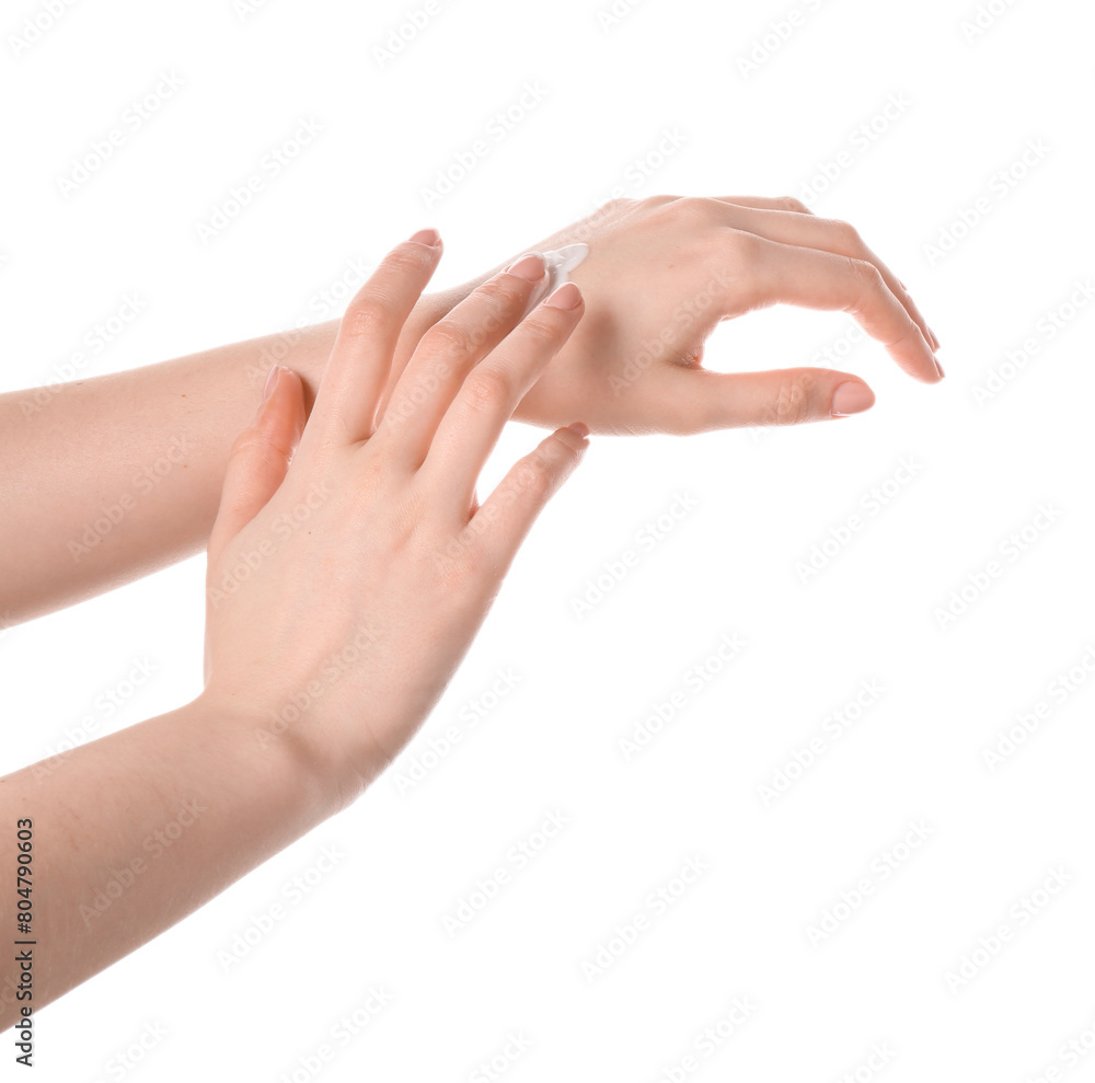 Woman applying cream on her hand against white background, closeup Woman applying cream on her hand against white background, closeup