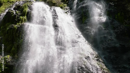 waterfall in the tropical mountain jungle slow motion balea falls in the jungle neg SBV 348698829 4K  photo