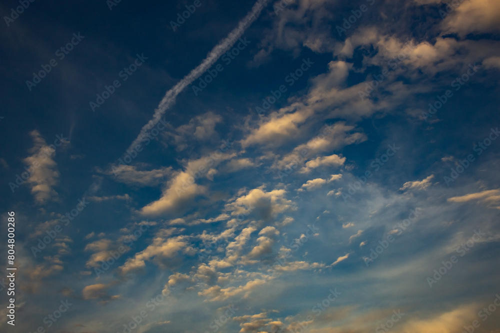 Beautiful clouds in the sky at sunset background. Nature cloudscape. Beautiful clouds in the sky at sunset background. Nature cloudscape.