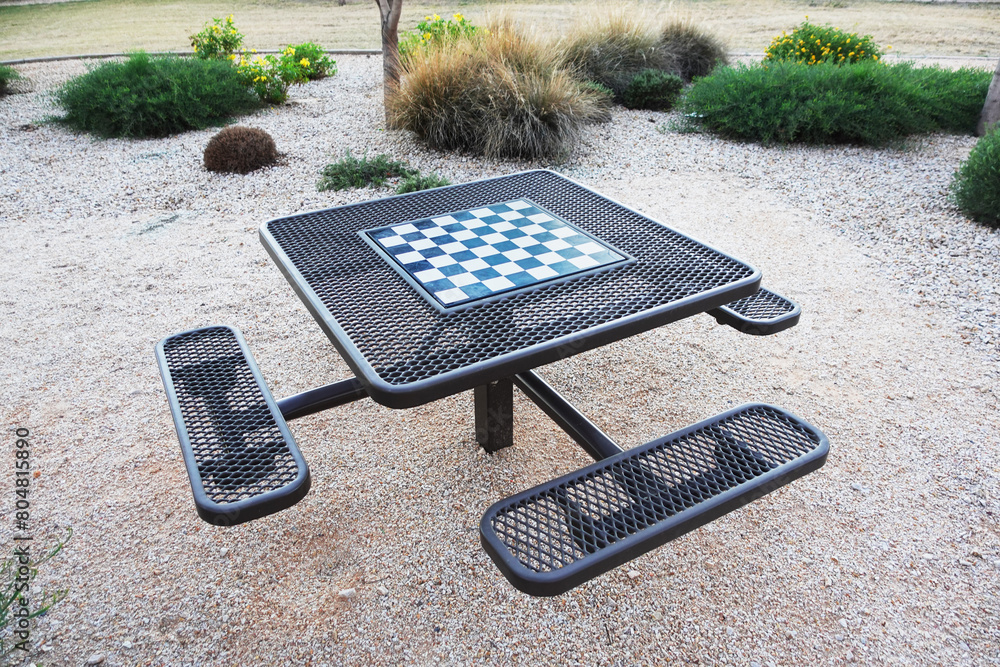 © Rix Pix - Metal mesh chess table with seats in a public park