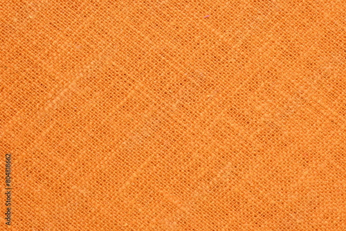 Obraz na plátně orange hemp viscose natural fabric cloth color, sackcloth rough texture of texti