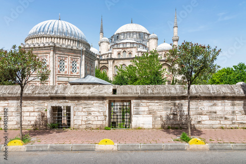Sehzade Mehmet Turbesi or tomb, with Sehzade Mosque, or Sehzade Camii in the far end, located in the district of Fatih, on the third hill of Istanbul, Turkey photo