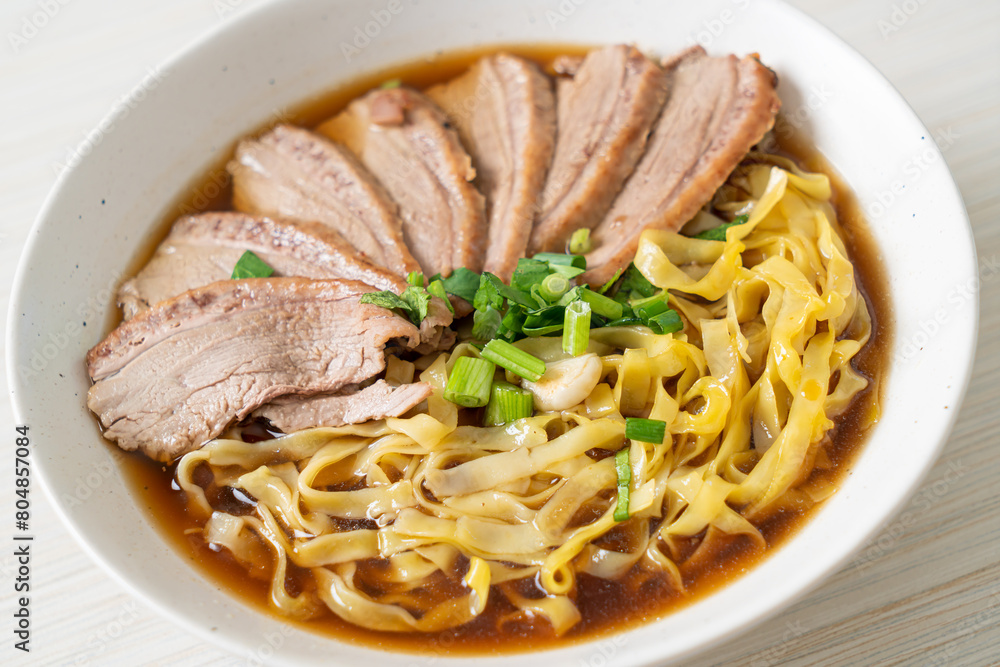 egg noodles with stewed duck in brown soup egg noodles with stewed duck in brown soup