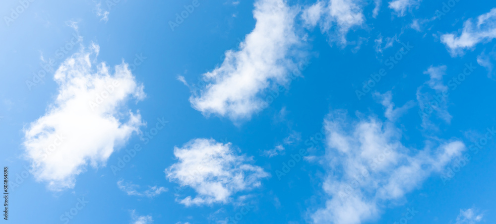 Obraz premium Beautiful blue sky with strange shape of clouds in the morning or evening used as natural background texture in decorative art work