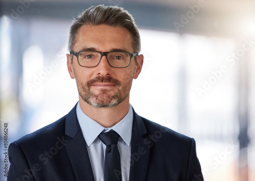 CEO, corporate and portrait of business man in office for confidence, happiness or positive. Lens flare, entrepreneur and management person for company growth, pride or professional attitude