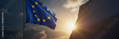 European Union flags on blue sky background photo