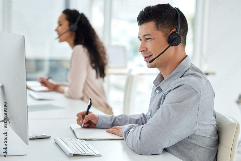 Call centre, man and notebook for customer service, headset or headphones in office, business and telemarketing. Online, writing and listening for information, help and consulting for insurance Call centre, man and notebook for customer service, headset or headphones in office, business and telemarketing. Online, writing and listening for information, help and consulting for insurance