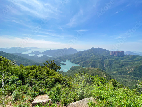 Serene Vista of Tai Tam Reservoir Amidst Lush Greenery, Hong Kong Island Trail photo