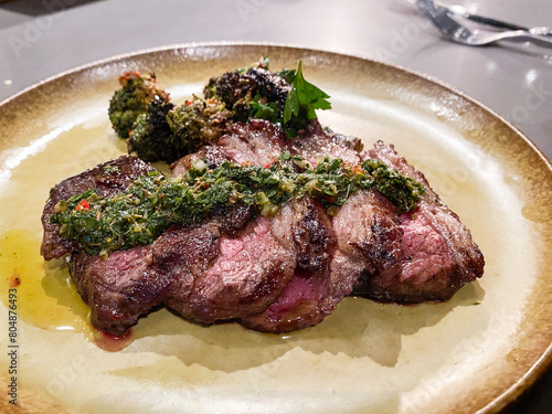 Succulent Grilled Steak Topped with Fresh Herbs