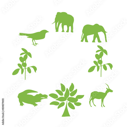 Silhouettes of trees and animals walking around