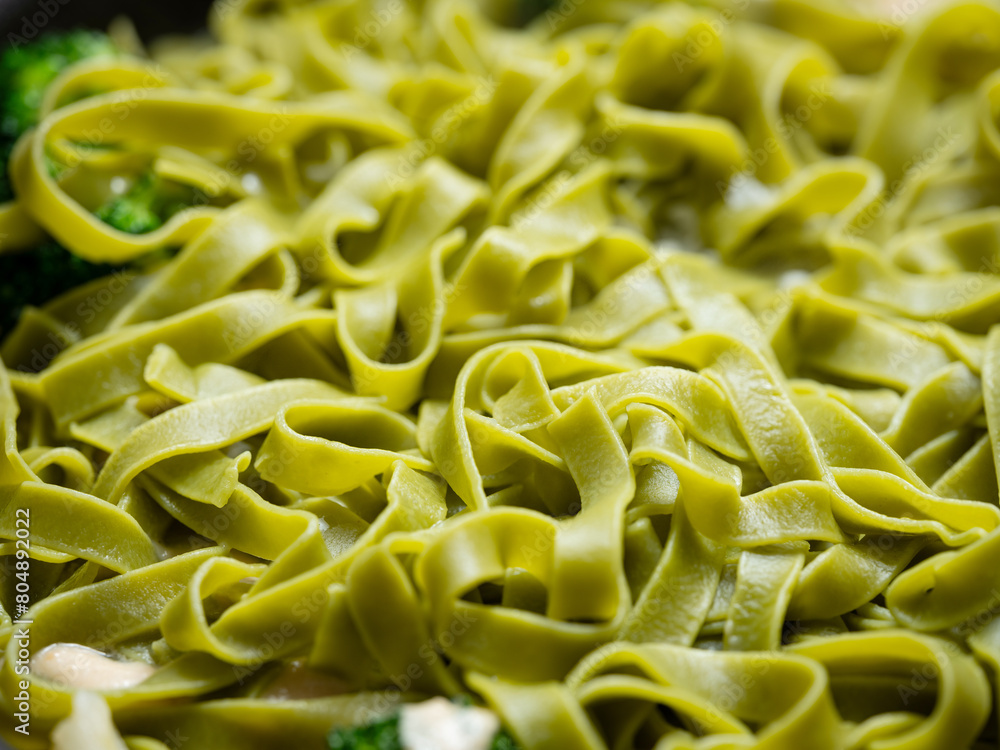 Spinach pasta boiling in a pot Spinach pasta boiling in a pot