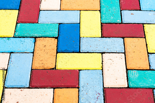 Bright colorful floor block paving, in the children's playground area