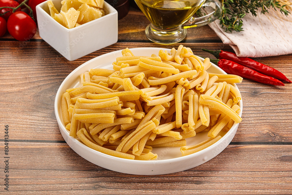 Raw dry Italian pasta - casarecce Raw dry Italian pasta - casarecce
