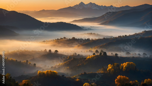 A mystical sunrise casts its golden glow over mist-covered mountains  painting a breathtaking scene.