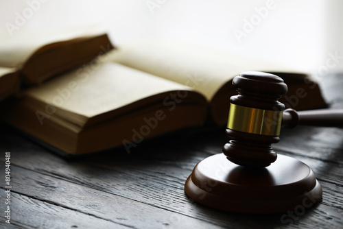 Judges gavel on wooden desk. Law firm concept.