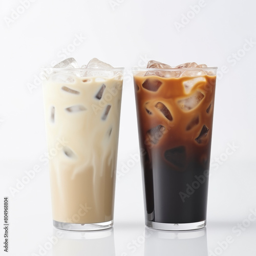 Two glasses of iced coffee beverages, one with milk and one black, against a white background