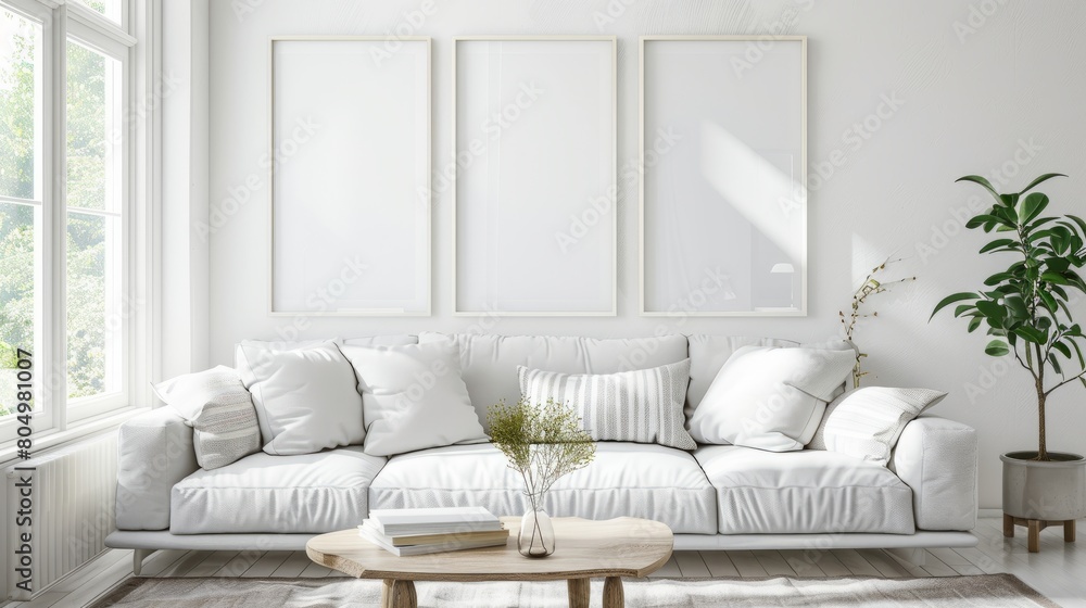 render of three vertical blank frames in a mockup cozy living room, a white sofa with striped pillows and a wooden white table near a window with natural light, white walls