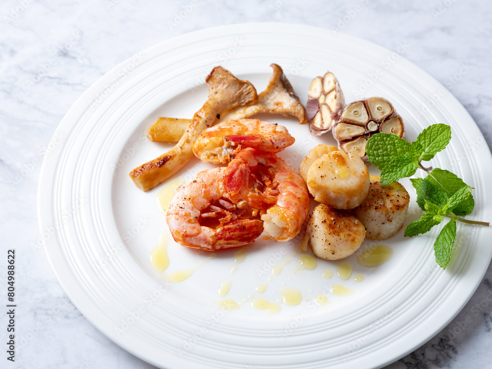 Grilled shrimp and scallops on a plate Grilled shrimp and scallops on a plate