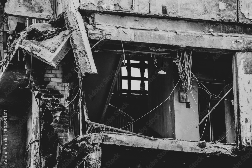 Fototapeta premium destroyed and burned houses in the city during the war in Ukraine