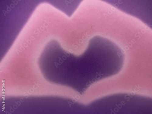Banner with two hands forming a heart, in contrasting colors, from purple to pink, Valentine's Day.