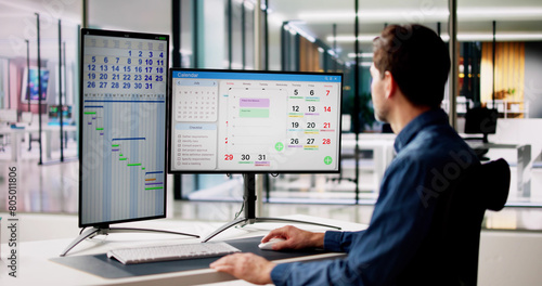 Employees Staff Schedule And Time Reports Or Computer photo