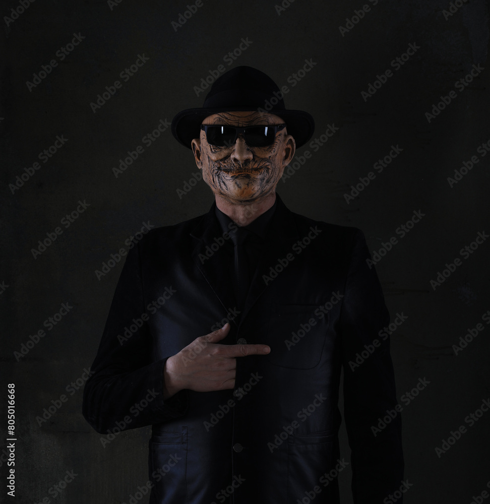 portrait of an old man in a black hat and black jacket portrait of an old man in a black hat and black jacket