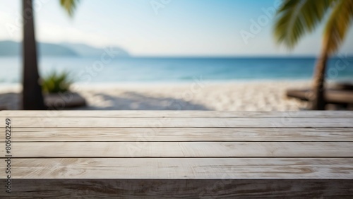 Wood table top on blur tropical beach background - can be used for display or montage your products