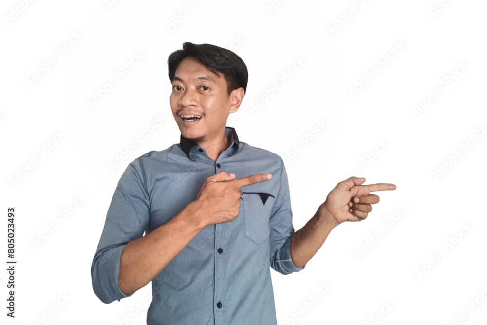 A portrait of an Asian man wearing a ligh blue shirt, pointing in a certain direction with both hands, isolated on a white background. A portrait of an Asian man wearing a ligh blue shirt, pointing in a certain direction with both hands, isolated on a white background.