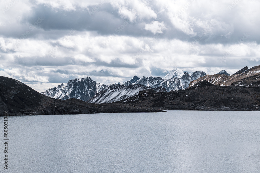 Fototapeta premium pastoruri glacier landscape with a laguna in snow covered andes in the national park Huascarán