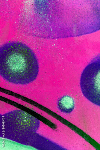 colorful background pattern of urban streen wall graffiti for concept and design. Aerosol bright vivid painting on a city walls