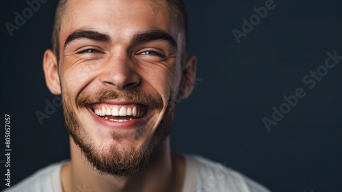 Closeup portrait of handsome smiling young man. Laughing joyful cheerful men isolated studio shot. Panoramic banner hyper realistic 