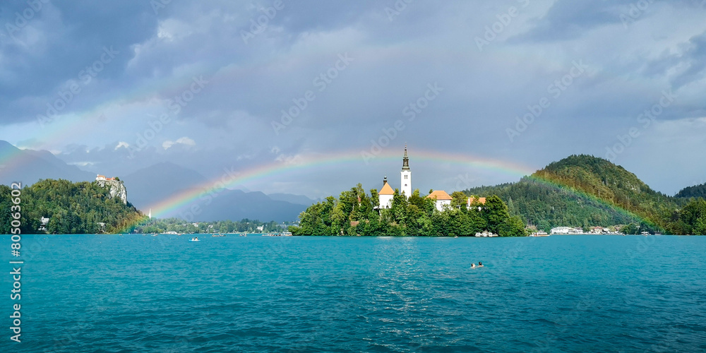 Rainbow over Bled Island in the summer