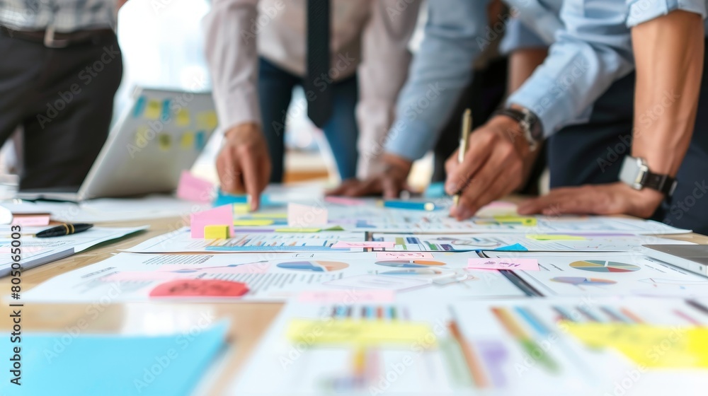 Fototapeta premium With focused attention, people discussing business plan outline objectives and milestones, their meticulous planning laying the foundation for future growth.