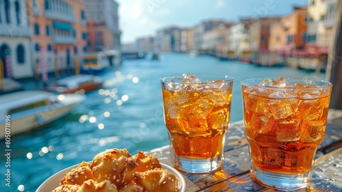 Fototapeta Naklejka Na Ścianę i Meble -  Enjoying Aperol Spritz with Traditional Snacks on a Sunny Day in Venice