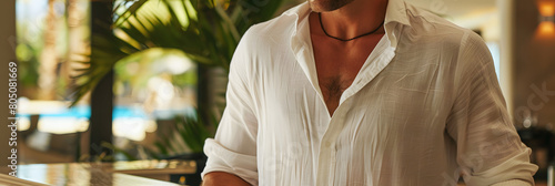 close shot of concierge at Palm Springs hotel reception desk, cool boutique hotel, shirt unbuttoned photo