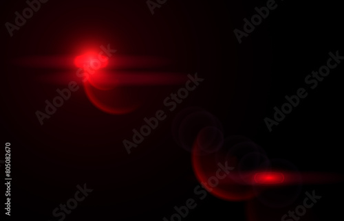 Lens flare red glow light effect on black. image of rays light effects, overlays or flare isolated on black background for design. lens flare light over black background © Celt Studio