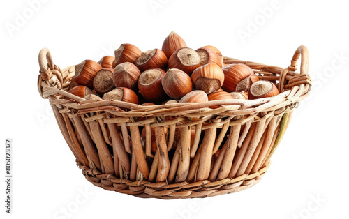 Singular Focus, Hazelnuts in Wicker Basket on White, Hazelnuts Arranged in a Wicker Basket, Copy Space