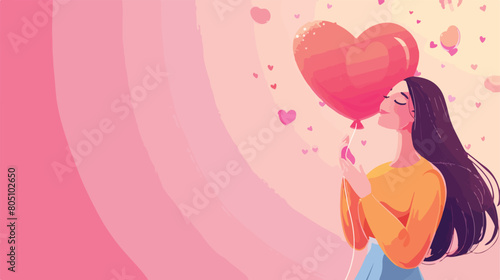 Happy young woman with heart shaped air balloon 
