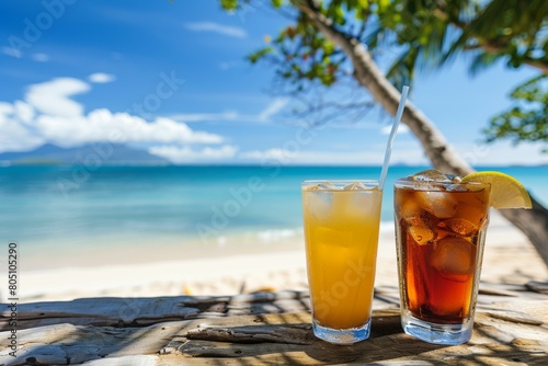 Two refreshing drinks on a tropical beach with ocean views. 