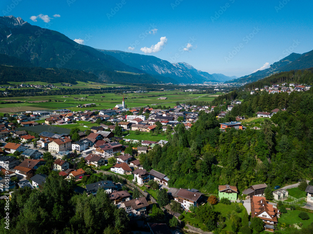 Aerial drone view of Weer city nestled in Austrian valley