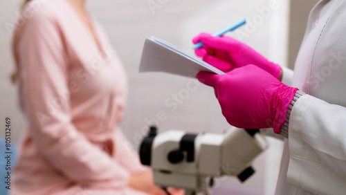 A female patient has a consultation with her gynecologist in a medical clinic. Women's health, colposcopy, examination of the uterus and ovaries.