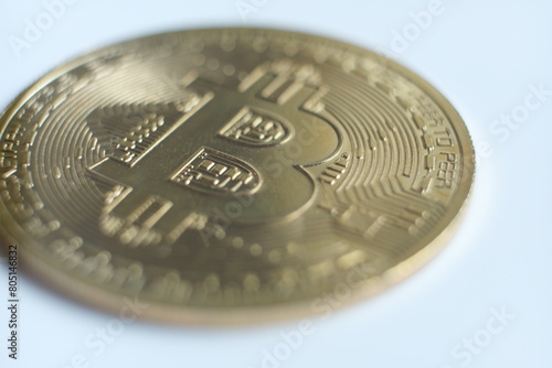 bitcoin golden coin macro close up logo on white background 