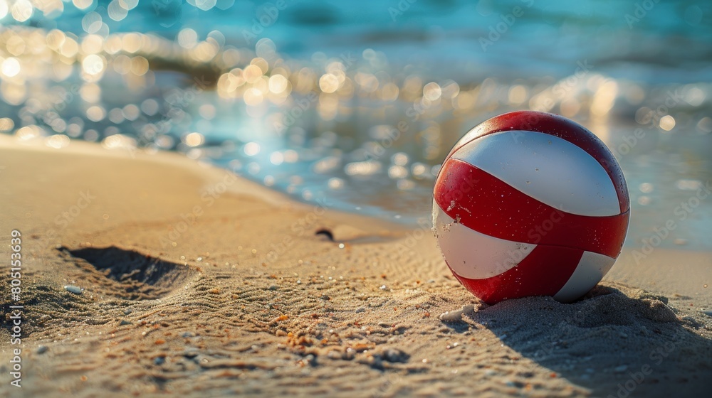 Obraz premium A Close-Up Portrait of a White Red Beach Volleyball Positioned on the Sandy Shoreline, Embracing the Joy and Vitality of Beachside Recreation