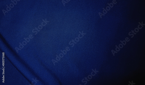 Dark blue velvet fabric background in a luxurious style for graphic design